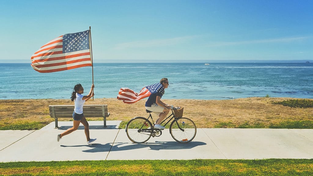 two people with american flags
